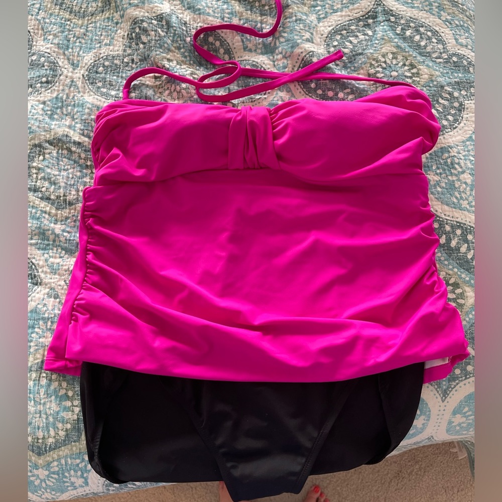 One piece swim suit…beautiful fuchsia and black.